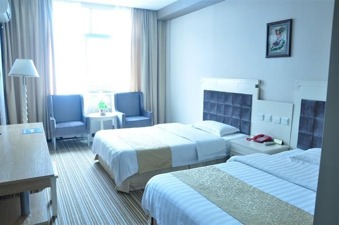Zhangjiajie Huaya Business Hotel Стая снимка